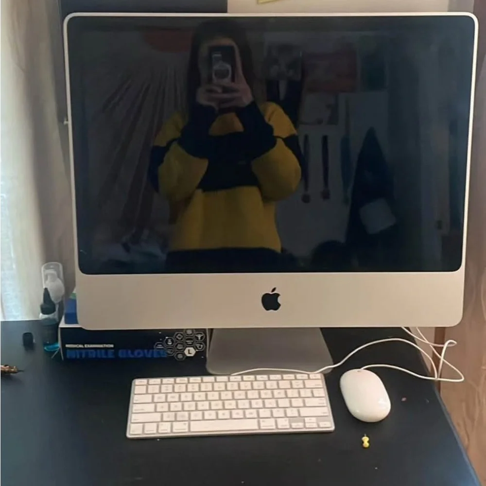 Apple iMac with Silver Finish and White Accessories